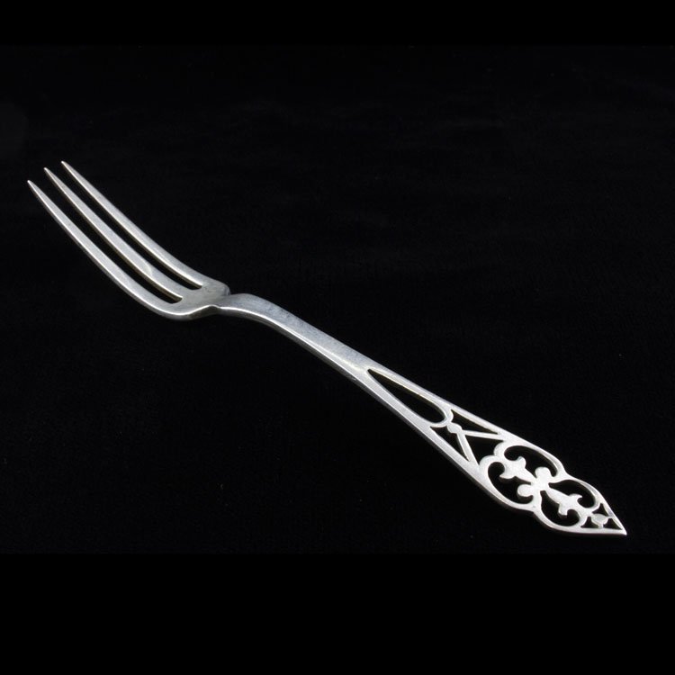 Watson King George Berry Fork: Est $ 40-90 Sterling berry fork made by the Watson Co. with the 1920 King George pattern. The fork is marked with the makers mark next to the word sterling and measures 5" long x 1/2" wide and weighs 