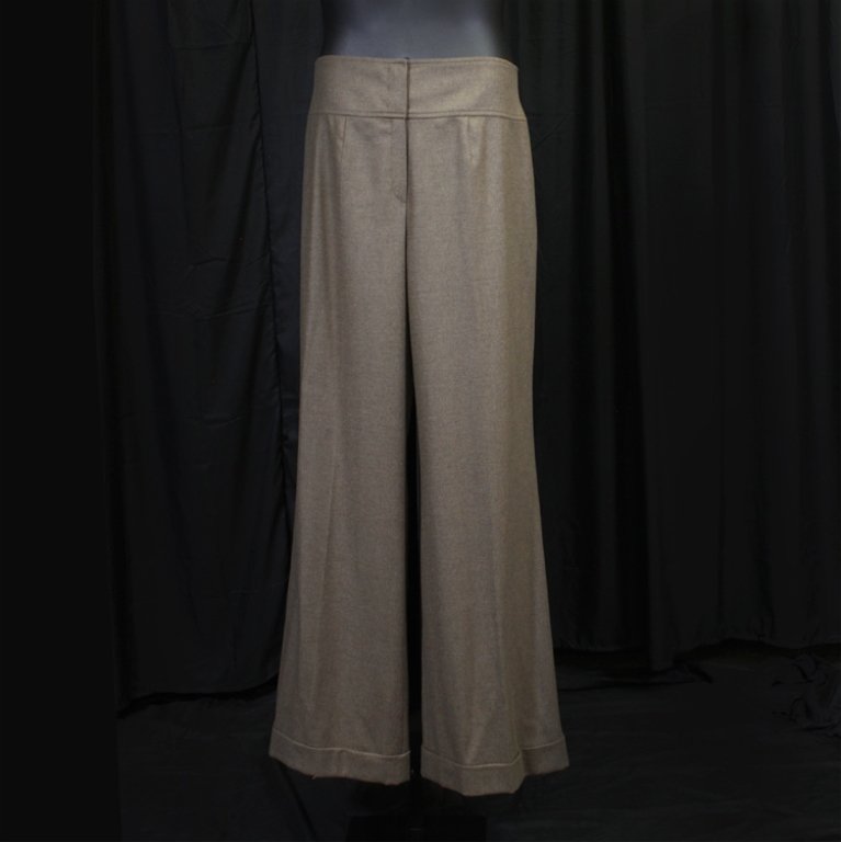 Brown Escada Dress Pants: Est. $ 80 - 120 Escada, size 46 brown dress pants. With a 38" waist, 46" hips, 34" inseam.