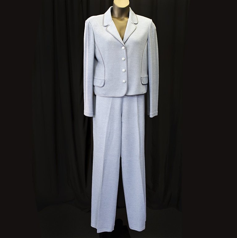 St. John Collection Pants Suit: Est. $ 100 - 200 St. John Collection button up blue knit jacket with discoloration on the right arm, size 16. Comes with matching knit pants, size 14. Jacket: 40" bust, 37" waist, 18" shoulder. Pants:
