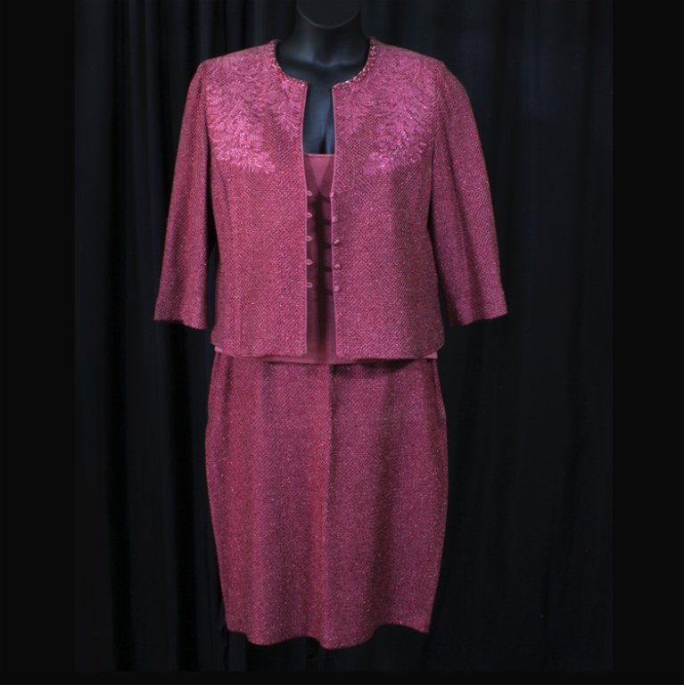 St. John Evening Skirt Set: Est. $ 100 - 200 Tea rose St. John Evening Skirt set with a size 16 bead and embroidery button up jacket, size xl spagetti strap top and a size 14 skirt .Top: 39" bust, 36" waist. Jacket: 42" bust, 40