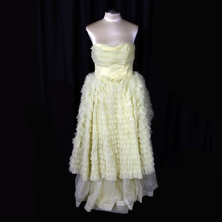 Vintage Yellow Ruffle Strapless Dress: Est. $ 200 - 300 Vintage1950's yellow ruffle strapless dress 31" bust, 24" waist and 41" long.