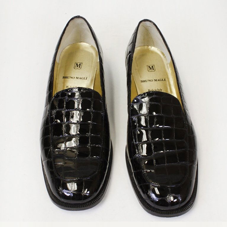 Bruno Magli Black Loafers: Est. $ 100 - 200 Black loafers made in Bologna Italy by Bruno Magli with scuffed soles.Size 10 1/2