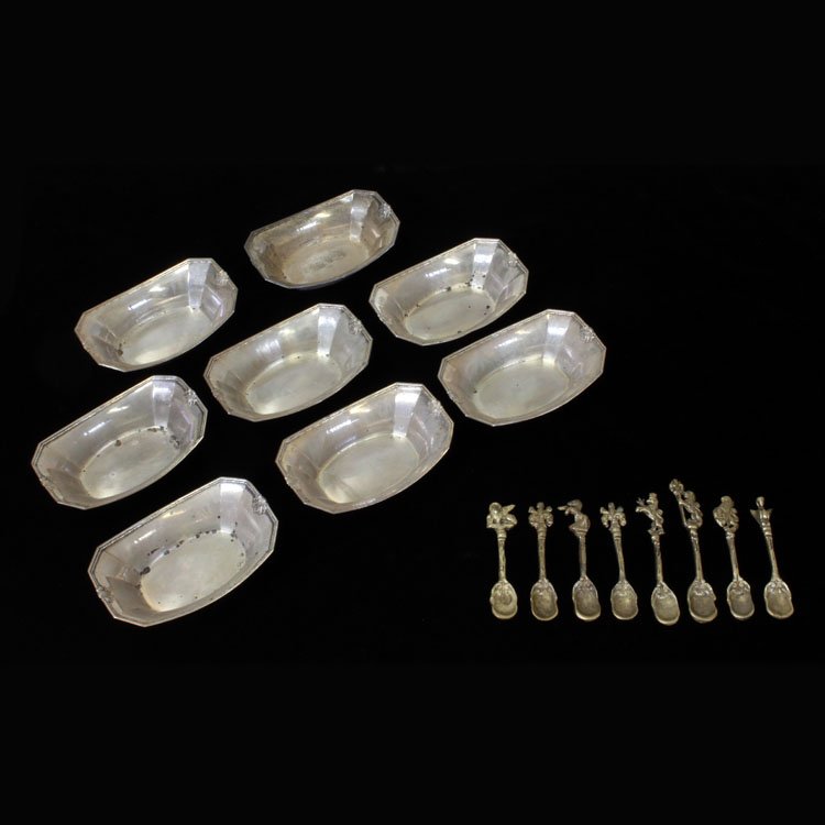 Set of 8 Sterling Master Salt Cellars & Spoons: Est. $ 300 - 400 8 Italian Salt Spoons and 8 Sterling Master Salt Cellars (8) Salt spoons marked Italy that terminate into fleur de lis and lions. They measure 2 1/2" long x 3/8" wide and they weigh 1