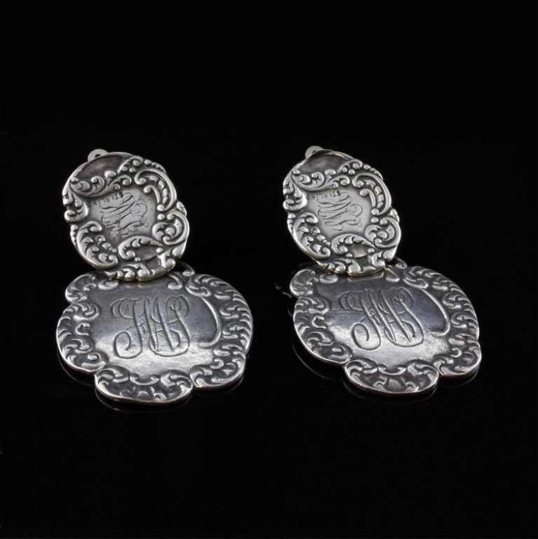 Vintage Foree Luggage Tag Earrings in Sterling: Est. $ 75 - 150. Vintage Foree Luggage Tag Earrings in Sterling. 18.34gr. Clip on style two piece Foree luggage tag earrings with clip on backs. Monogrammed. 2 X 1 1/8".
