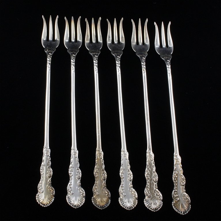 Set of 6 Silverplate Holmes & Edwards XIV Forks: Est $ 60-120 Set of six cocktail forks marked Holmes & Edwards XIV and Pat. 5 3/4" long x 1/2" wide.