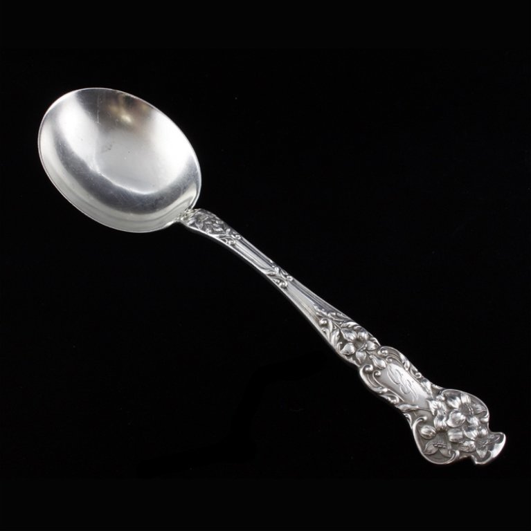 Sterling Watson Magnolia Round Soup Spoon: Est $ 60-120 Soup spoon with the 1908 Magnolia pattern. Marked Watson, Sterling and measures 6 7/8" long. 1.2 ozt.