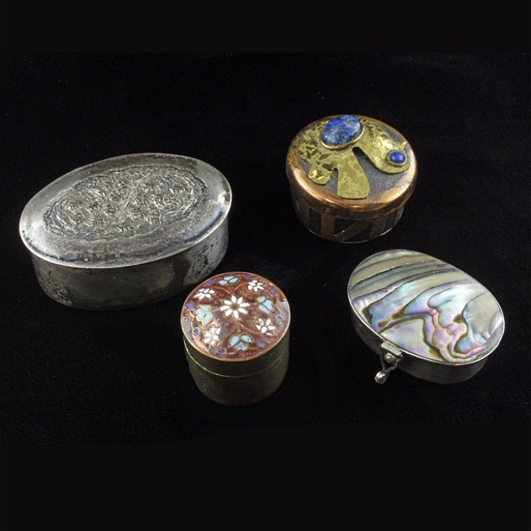 Set of Four Containers/ Pill Boxes: Est $ 80-160 Set of four pill boxes/ containers. 1) Round gold toned container with an enamel floral lid. 7/8" diamter x 3/4" tall. 2) Oval container with a repousse floral lid that has color discolor