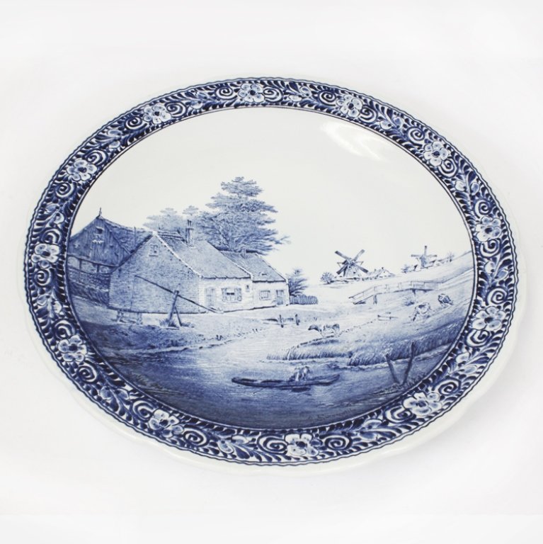 Large Boch Belgium Royal Sphinx Delfts: Est $ 100-200 Large delfts wall hanger/ charger plate. Marked on the back "Made for Royal Sphinx by Boch Belgium", "Holland", "Delfts". The plate has a floral boarder around a scenic motif of a house,