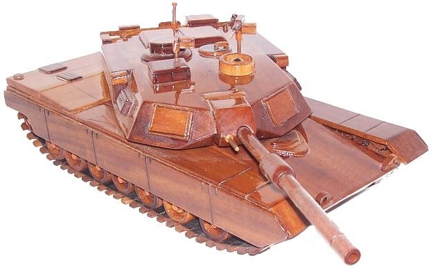 Mahogany M1 Abrams Tank Model: Est $ 100-200 Mahogany M1 Abrams Tank Model in an unopened box.
