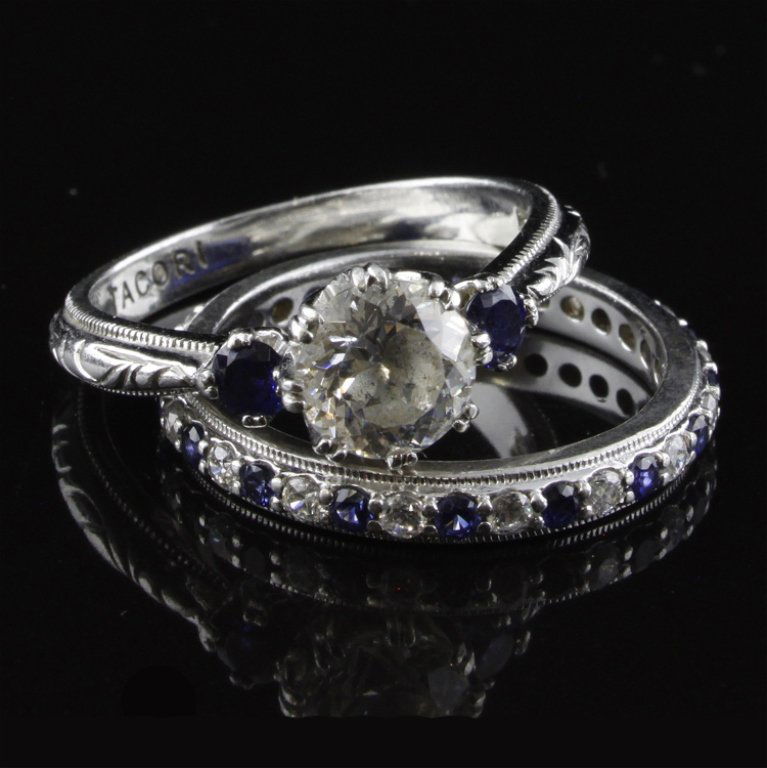 Tacori Bridal Set with CZ in Sterling: Est. $ 150 - 300 Tacori Bridal Set with CZ in Sterling 8.70 gr tw. Tacori brand bridal set. Gemstones: cubic zirconia and blue gemstone. Marks: Tacori, CZ, 925, and China.