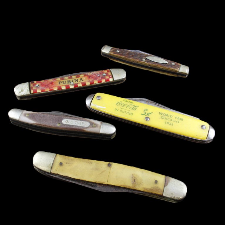 Lot of 5 Miscellaneous Pocket Knives: Est $ 80-160 Lot of 5 pocket knives indluding: 1) Purina red and yellow checkered pocket knife 3 1/8" long. 1) Sabre Japan pocket knife with stainles steel blades2 5/8" long. 1) Old timer pocket knife