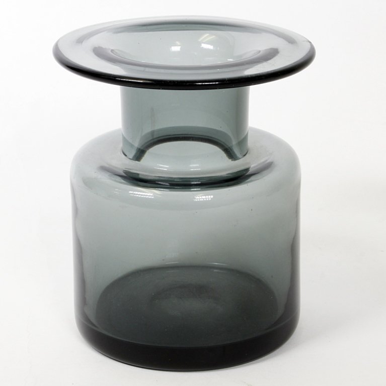 Per Lutken Holmegaard Art Glass Vase: Est $ 150-300 Smoke glass vase by Per Lutken signed Holmegaard. The vase measures 5" tall. Third party shipping.
