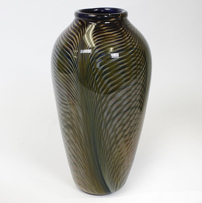 Kit Karbler & Michael David Art Glass Vase: Est $ 150-300 Art glass vase signed by Kit Karbler & Michael David with the year that appears to be 1988. The vase is multicolored and measures 10" tall. Third party shipping.
