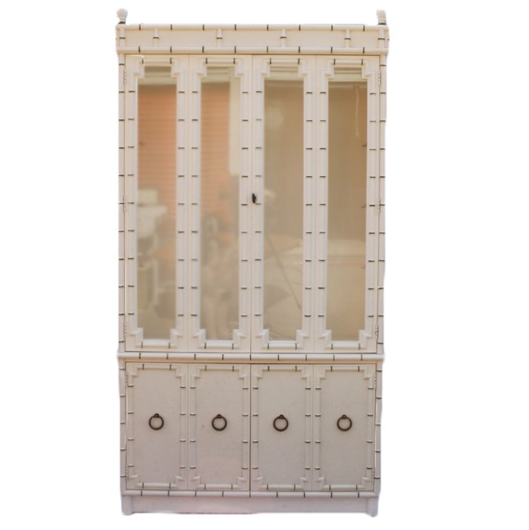 White Vintage Drexel Heritage China Cabinet: Est $ 350-600 Vintage white faux bamboo china cabinet with three glass shelves and four glass doors. It measures 79" tall x 16 deep" x 42" wide. Third party shipping only.