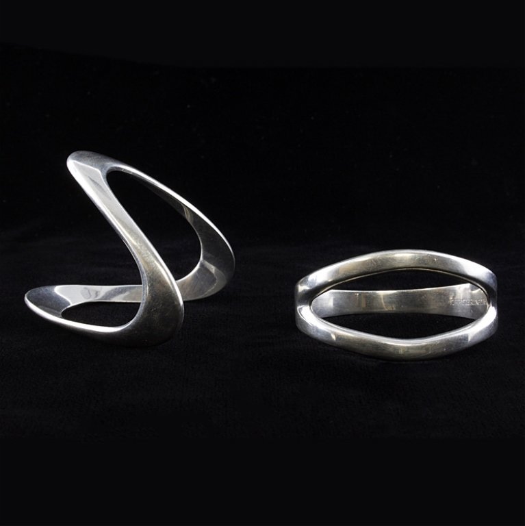 COHR Sterling Denmark Napkin Rings: Est. $50 - 60 Set of two napkin rings both marked "COHR, Denmark and Sterling". They weigh 1.2 ozt.