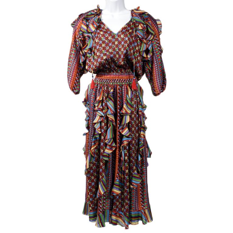 Vintage Diane Freis Dress: Est $ 50-60 Vintage Diane Freis 100% Polyester Dress. The waist expands up to 40", 56.5" long, 22" sleeve.