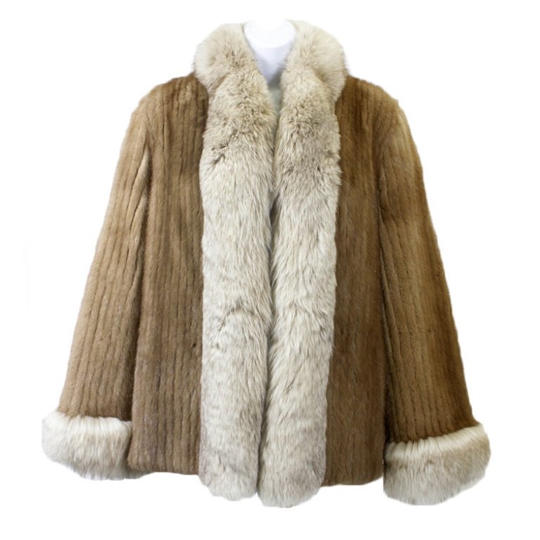 1960-70s Corduroy Style Mink Jacket with Fox Trim: Est. $ 400 - 600 1960-70s Corduroy Style Mink Jacket with Fox Trim. 1960-70's Cordoroy style Mink with fox trim Jacket. Good condition. Bust 40, Waist 42, Shoulder 17, Sleeve 24, Length 26. THIRD PART