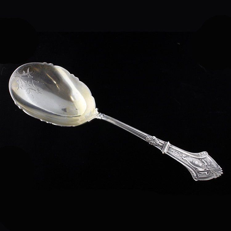 George Sharp American Coin Silver Serving Spoon: Est. $90 - 135 George Sharp American Coin Silver Serving Spoon. Weighs 2.53 ozt. Gold washed engraved bowl. Gothic style pattern. Measures 9.25 inches.