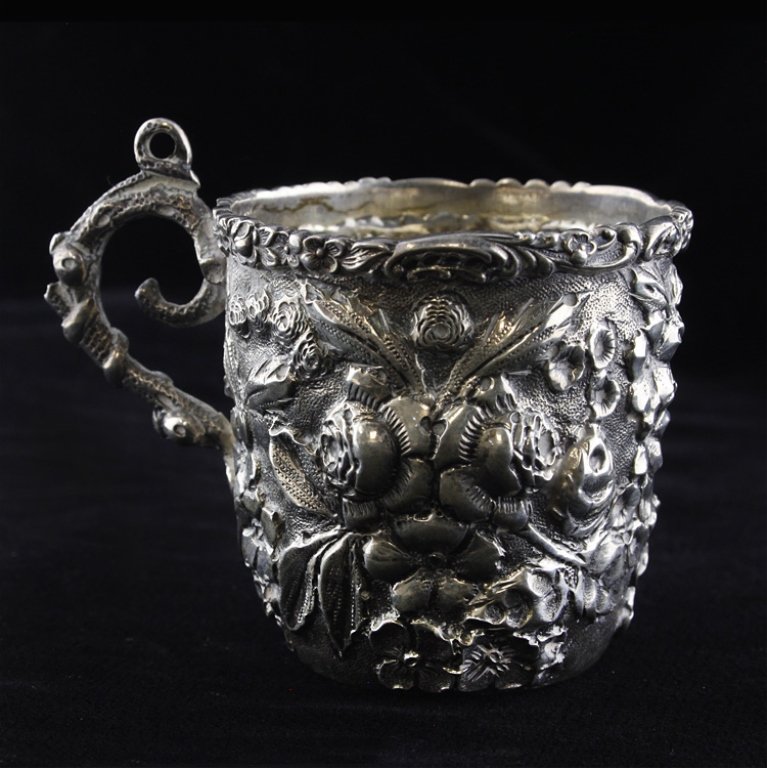 American Silver Repousse Demitasse Cup: Est. $70 - 105 American Silver Repousse Demitasse Cup . Weighs 1.33 ozt. American Silver made by Baltimore silver company, the predecessor to Stieff, repousse demitasse cup. Measures 2.0 x 1.75 inches