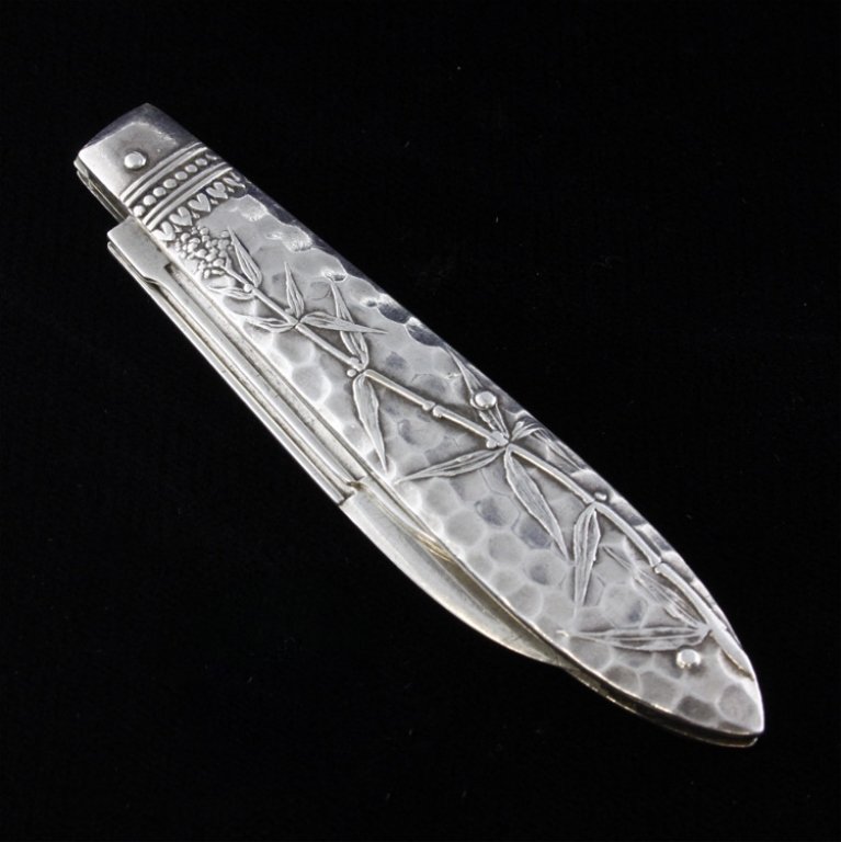 Gorham Sterling Folding Fruit Knife: Est. $200 - 300 Gorham Sterling Folding Fruit Knife. Weighs 1.2 ozt. Marked for Gorham early mark. Folding fruit knife Japonesque style from the Japanese influence. Measures 3.25 inches.