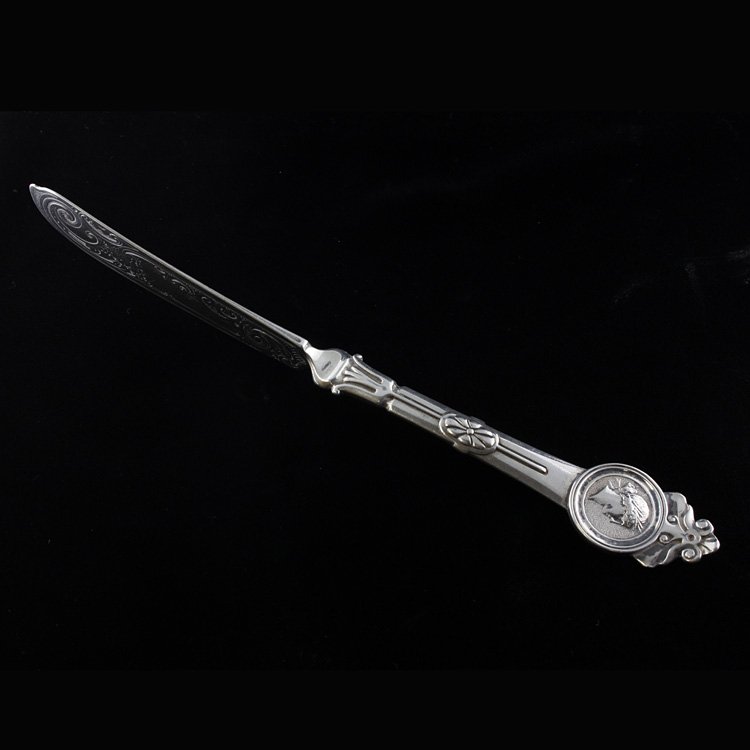 Gorham Medallion Butter Knife: Est. $50 - 75 Gorham Medallion Butter Knife. Weighs 1.38 ozt. Gorham old mark Medallion in coin silver. Engraved blade master butter inscription for 1865. Measures 7.25 inches.