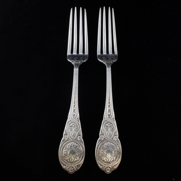 Two John Wendt Moresque Pattern Sterling Lunch Forks: Est. $120 - 180 Two John Wendt Moresque Pattern Sterling Lunch Forks. Weighs 3.54 ozt. Retailed by J. E. Caldwell. Measures 7.25 inches.
