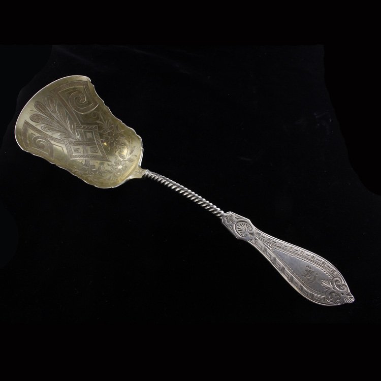 John L. Westervelt Berry or Cracker Scoop: Est. $100 - 150 John L. Westervelt Berry or Cracker Scoop. Weighs 2.59 ozt. Twist handle, beautifully engraved, goldwash bowl. Coin silver. John L. Westervelt from New York, a well known and accomplis