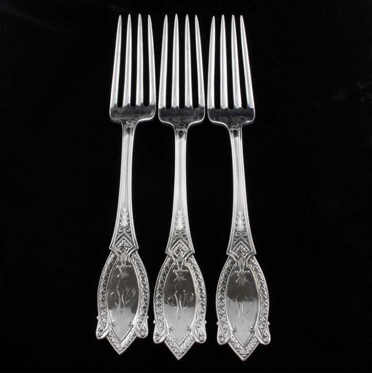 Three John Polhamus Diamond Sterling Dinner Forks: Est. $220 - 330 John Polhamus Diamond 3 Sterling Dinner Forks. Weighs 5.92 ozt. Diamond pattern three dinner forks made for Tiffany. Measures 7.75 inches.