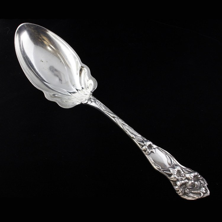 Watson Lily Sterling Serving Spoon: Est. $140 - 210 Watson Lily Sterling Serving Spoon . Weighs 3.29 ozt. Watson Lily serving spoon with pointed end. Measures 9 inches.