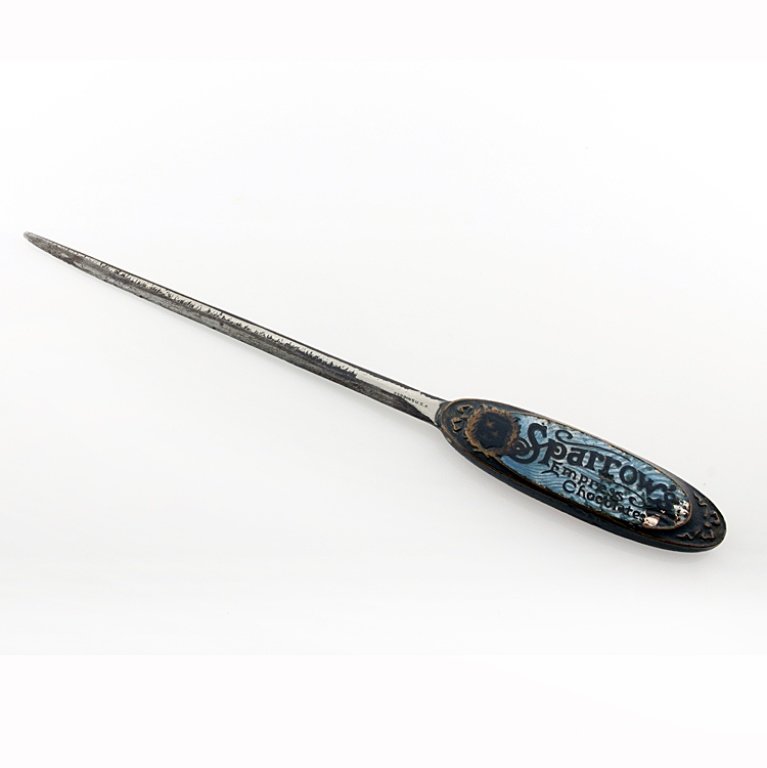 Sparrow's Empress Chocolate Letter Opener: Est. $10 - 15 Sparrow's Empress Chocolate Letter Opener. Letter opener with figural design of woman on handle. Some wear on blade and enamel. Measures 7 1/2".
