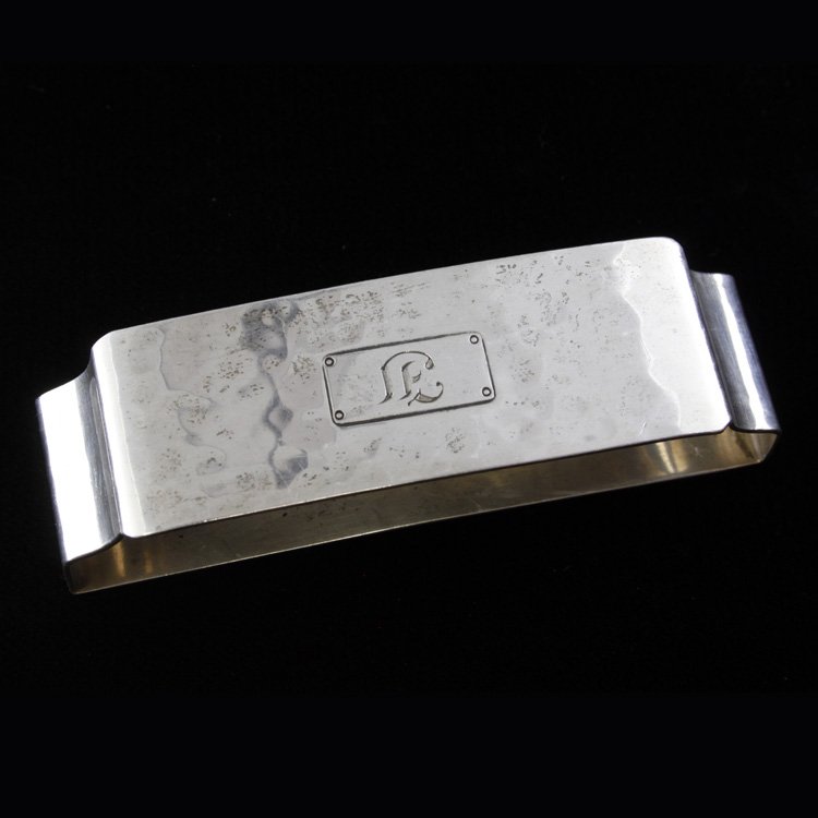 American Silver Watrous Hammered Napkin Ring: Est. $30 - 45 American Silver Watrous Hammered Napkin Ring. Weighs 0.9 ozt. Measures 3 inches.