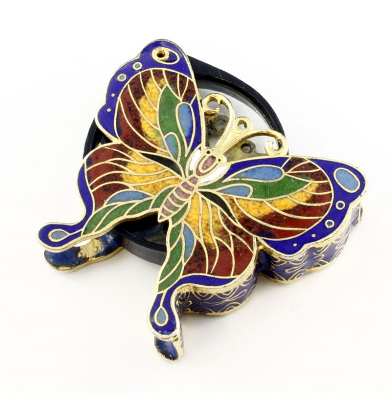 Vtg. Cloisonne Butterfly Magnifying Glass: Est. $50 - 70 Vtg. Cloisonne Butterfly Magnifying Glass. Foldable magnifying glass into cloisonne butterfly. Butterfly is 1.5 x 1.75 inches. Magnifying glass is 1.25 diameter.