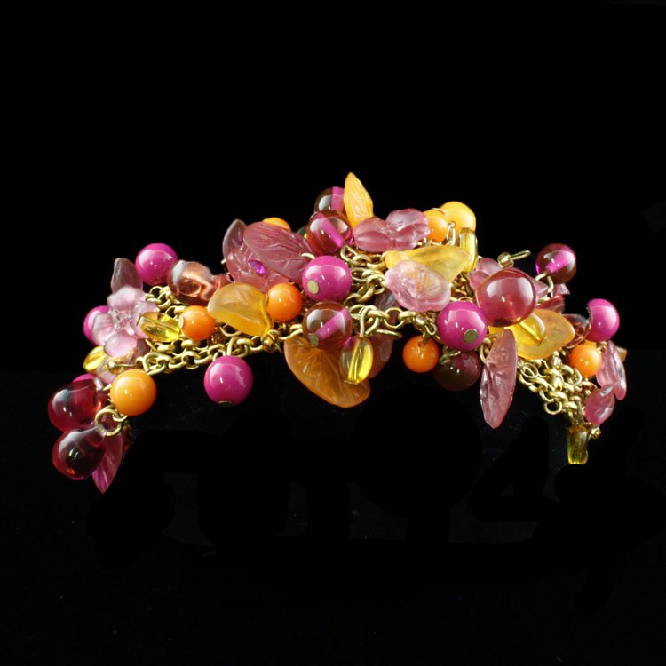 Vintage Bright Colored Bracelet: Est. $30 - 50 Vintage Bright Colored Bracelet . Adjustable up to 9 inches.