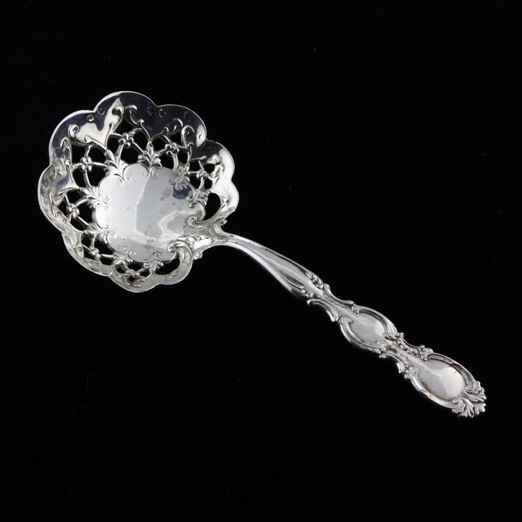 Simons Bros Sterling Silver Bon Bon Scoop: Est. $15 - 25 Simons Bros Sterling Silver Bon Bon Scoop. Sterling silver bon bon scoop by Simons Bros in the SSB1 pattern. Measures 4 3/8" long. Weighs .42 ozt. Marks: Simons Bros makers mark, sterlin