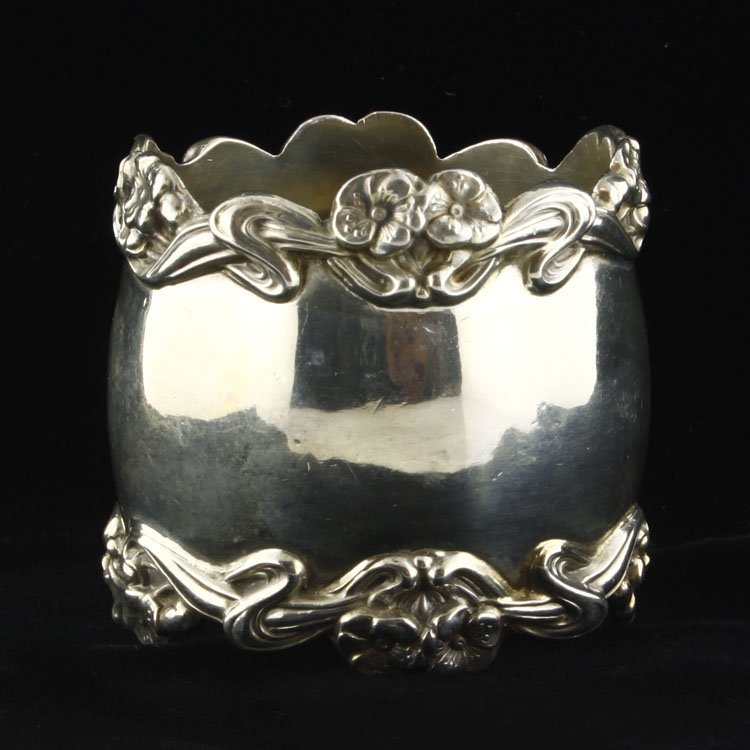 Unger Brothers Napkin Ring: Est. $40 - 60 Unger Brothers Napkin Ring. Weighs 1.27 ozt. Measures 1.75" tall by 1.75" wide. Marked Unger Bros, Sterling, 925, Fine, Unger Brothers.