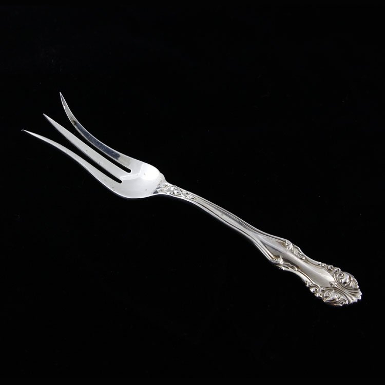 Frank Smith Lemon Fork: Est. $20 - 30 Frank Smith Lemon Fork. Weighs .47 ozt. Measures 4 7/8" long. Marked Frank Smith, Sterling