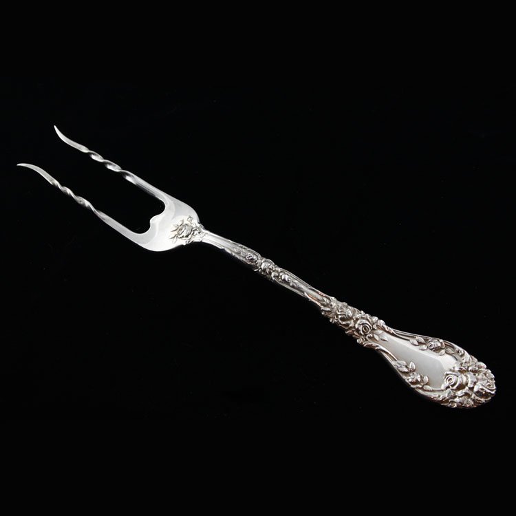 Durgin Sterling Baked Potato Fork: Est. $40 - 60 Durgin Sterling Baked Potato Fork. Sterling silver baked potato fork by Durgin in the Marechal Niel pattern, no monograms. Measures 7 1/8" long. Weighs 1.445ozt. Marks: Durgin makers mar