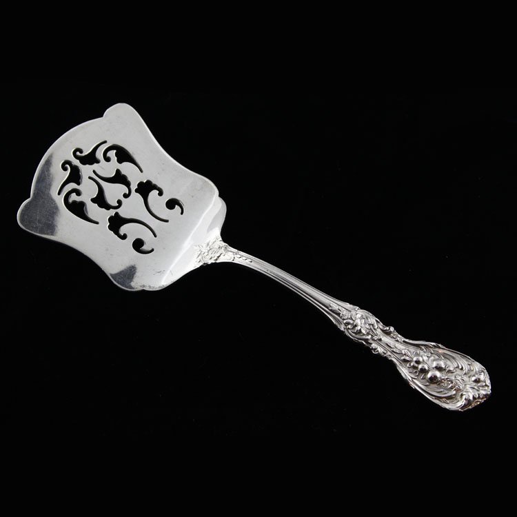 Reed & Barton Pierced Sterling Sardine Server: Est. $40 - 60 Reed & Barton Pierced Sterling Sardine Server. Sterling silver sardine server by Reed & Barton in the Francis I pattern. Measures 5 7/8" long. Weighs 1.41ozt. Marks: sterling, Reed & Bar