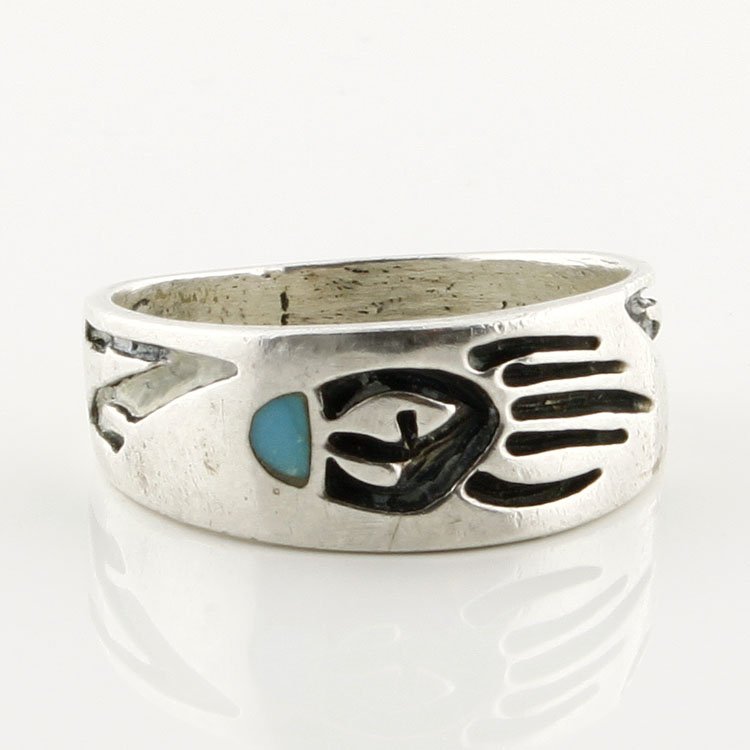 Hopi Artist Nathan Fred Jr. Ster. Bear Claw Ring: Est. $100 - 175 Hopi Artist Nathan Fred Jr. Ster. Bear Claw Ring. 5.3gr. Sterling. Bear clasw design by Hopi Indian artist Nathan Fred Jr. Inlaid turquoise. Marks: NF.