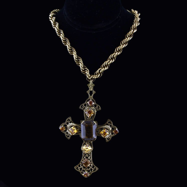 Vintage German Necklace & Cross Pendant: Est. $75 - 125 Vintage German Necklace & Cross Pendant. Vintage gold filled chain necklace made in Germany. 17" long. Pendant is gold toned with golden yellow square and rectangular, step cut gemstone
