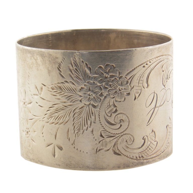Sterling Brite Cut Napkin Ring: Est. $30 - 45 Sterling Brite Cut Napkin Ring. Weighs .89 ozt. Measures 1.75" x 1.25". Marked Sterling. Monogrammed.