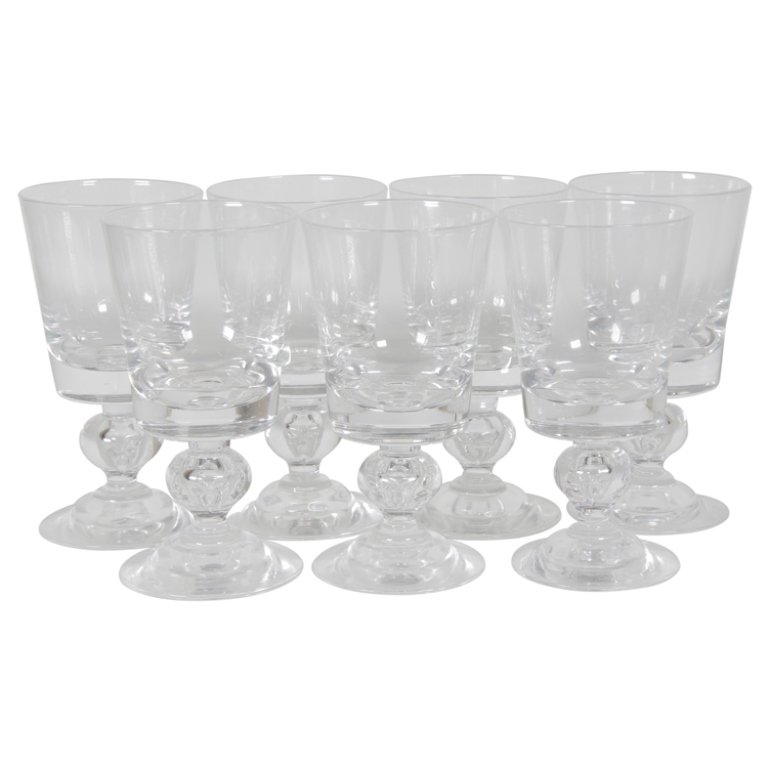 Set of 7 Steuben Chalice Crystal Glasses: Est. $500 - 800 Set of 7 Steuben Chalice Crystal Glasses. Measures 6.5" tall. Signed Steuben. One glass has small chip in base. Third Party Shipping