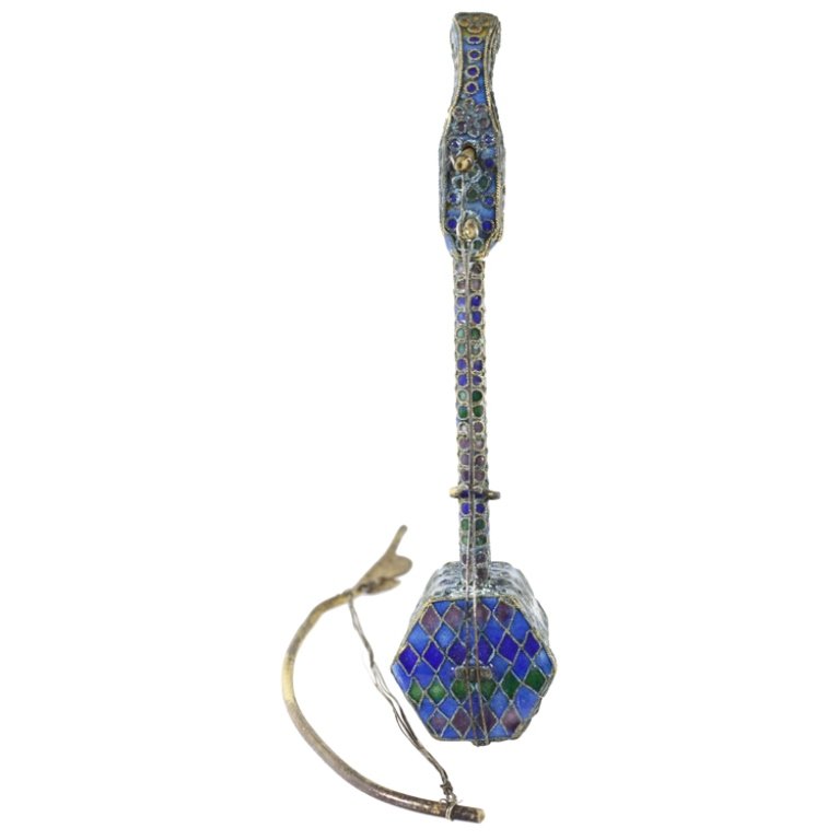 Vintage Mini Chinese Cloisonne Musical Instrument: Est. $100 - 300 Vintage Miniature Chinese Cloisonne Musical Instrument . Multi colored geometric pattern cloisonne. Stringed instrument with bow. 3 1/8" long.