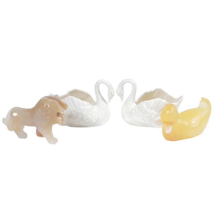 Lot of 4 Animal Figures ? Daum France: Est. $75 - 120 Lot of 4 Animal Figures 1 Daum France. The duck is marked Daum France. It measures 4.5" long. Lion measures 5" long. There is a lion, Duck and two swans. The swans are marked Lennox