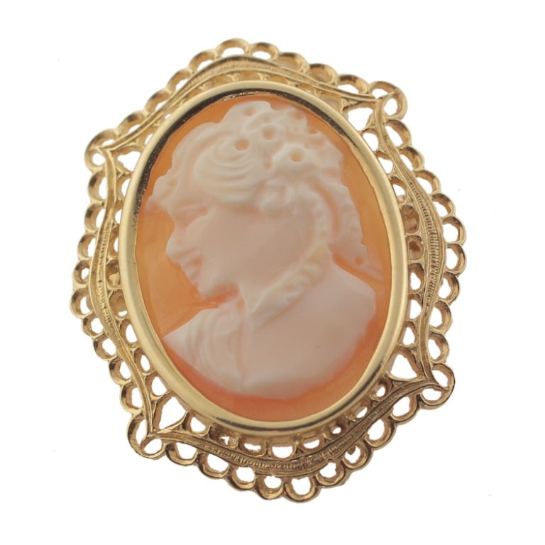Cameo Brooch/Pendant in 18k: Est. $300 - 500 Cameo Brooch/Pendant in 18k. 18k yellow gold. 5.3gr tw. Cameo, female image. Shell cameo. Oval 1 1/8 x 7/8" overall.