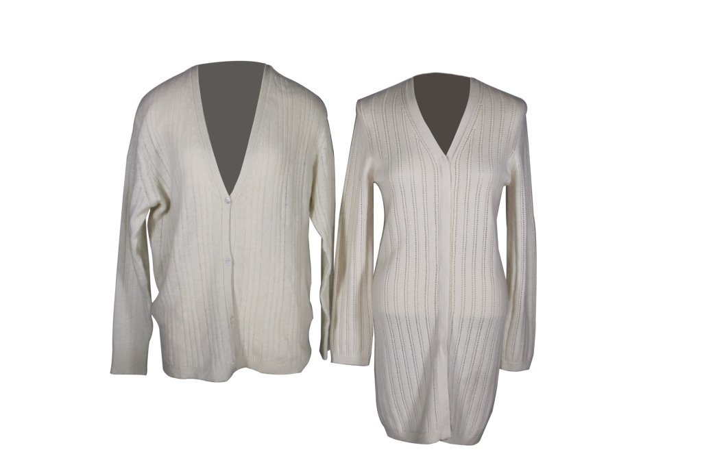 TSE Cashmere Sweater Pair: Est. $75 - 150 TSE Cashmere Sweater Pair. Both 100% pure cashmere. Long button up is a medium. Three button is a large. Minor staining