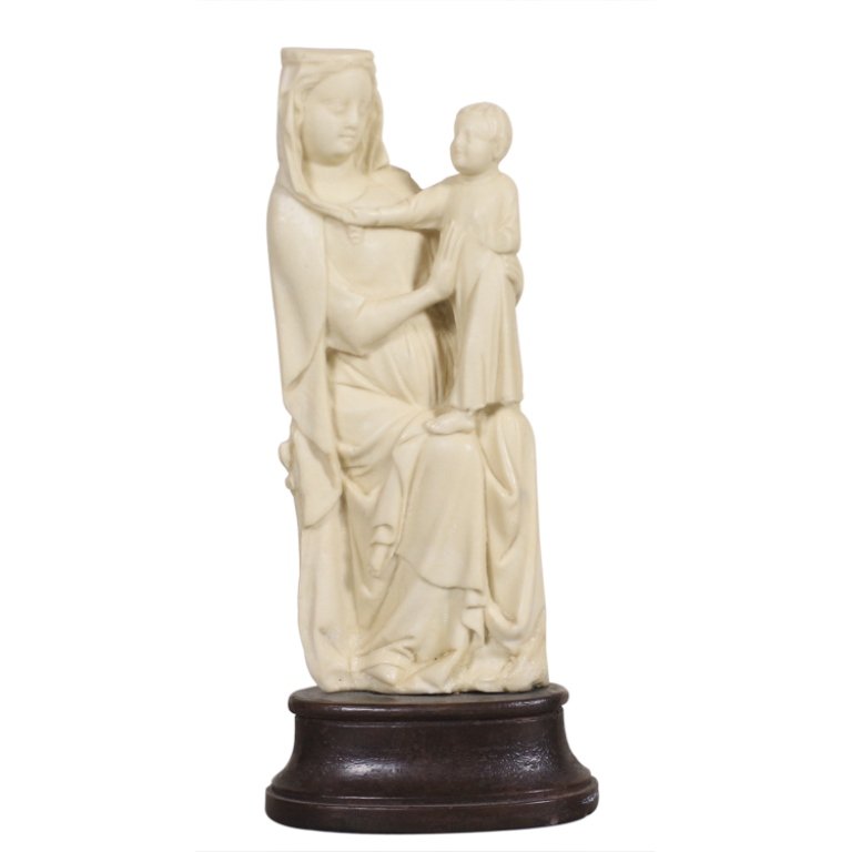 Soapstone Religious Carving: Est. $20 - 40 Soapstone Religious Carving. Measures 7.5” tall with base. Affixed to base.