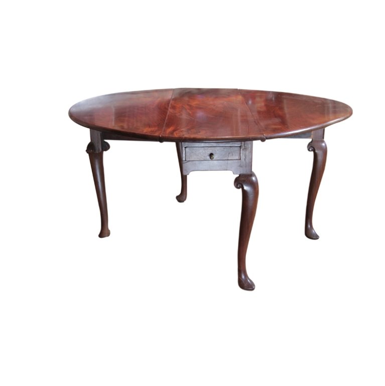 Early Georgian Style Drop Leaf Table: Est. $350 - 650 Early Georgian Style Drop Leaf Table. Drop leaf table with pointed slipper foot. Mahogany. 28 x 15 1/2 -53 1/2 x 41. THIRD PARTY SHIPPING