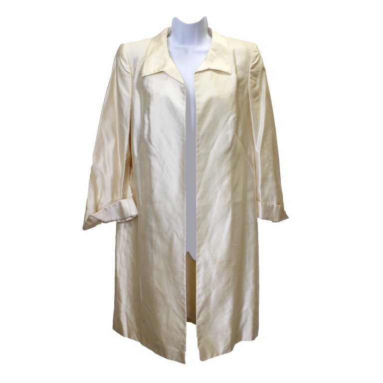 Escada Couture Light Jacket: Est. $50 - 75 Escada Couture Light Jacket. 100% silk. Size 38. Jacket has padded shoulder and some stains. Length 37.5. Bust 40. Waist 44.