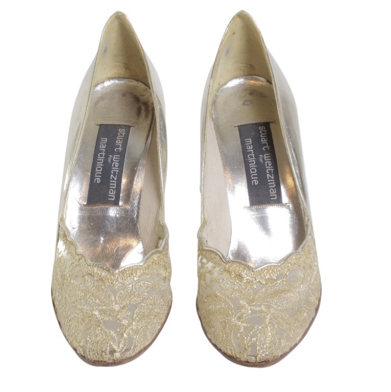 Stuart Weitzman for martinique Shoes: Est. $50 - 100 Stuart Weitzman for martinique Shoes. Marked Stuart Weitzman for martinque. No size found but measure to be 8" long. Shoes have wear and condition issues that are normal with use.